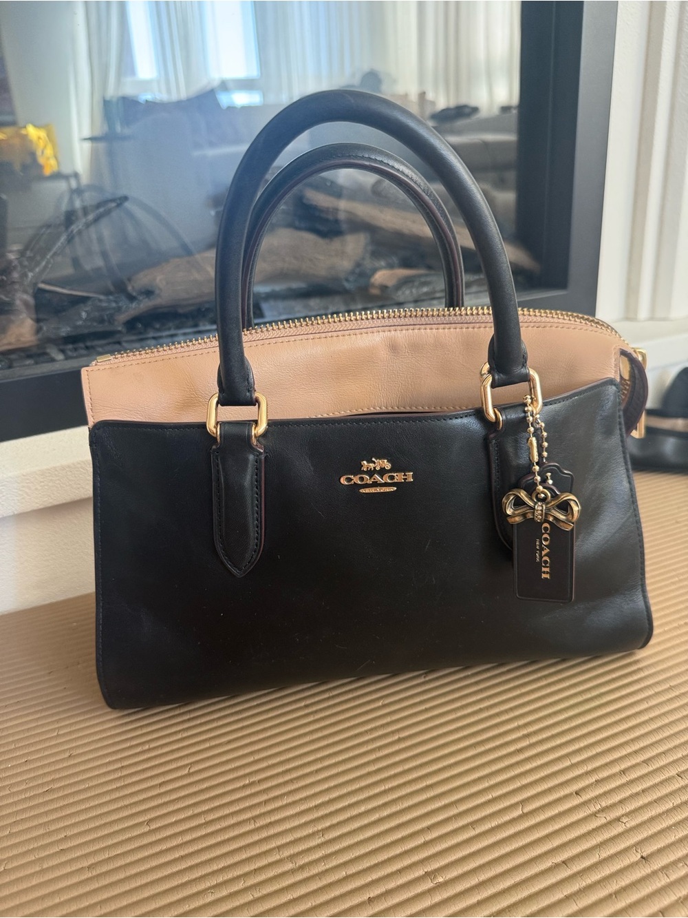 Selena Gomez bond bag- Coach Two-Tone Leather Satchel - Black & Beige